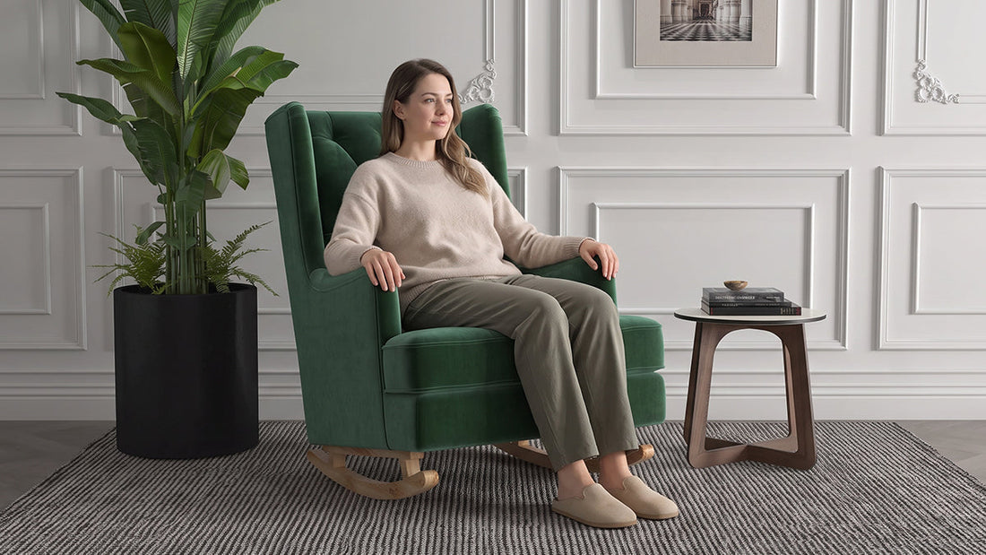 Emerald green tufted velvet rocking chair with a wooden base in a neutral living room.