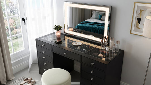 Black makeup vanity with LED mirror, glass top and storage drawers