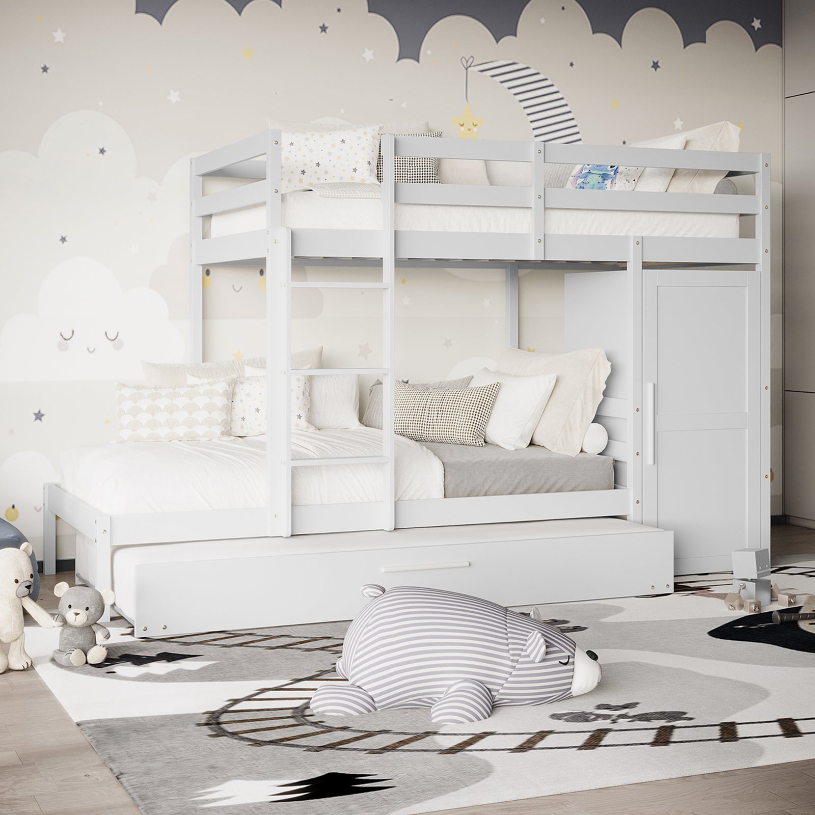 Aron Single Storage Bunk Bed with Trundle in White in a child’s room, featuring a loft-style design, pull-out drawer, neutral linens, star-patterned pillows, and adjacent cabinet for organized storage.