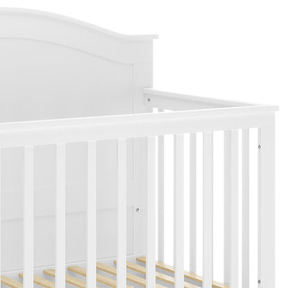 Azeem & Giro Baby Cot frame with visible slatted side rail and mattress support. Designed for pairing with Gydas 10cm Nursery Mattress, ensuring comfort and safety in a durable, spacious nursery setting.