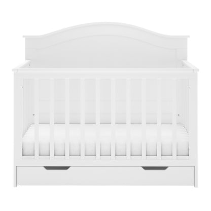 Azeem Baby Cot with slatted sides and curved headboard, featuring a pull-out storage drawer, paired with the Gettel 10cm High-Density Foam Knitted Baby Cot Mattress, showcasing a fully assembled, sleek design.