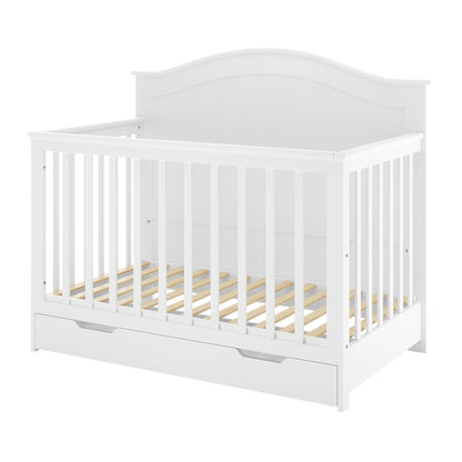 Azeem Baby Cot with vertical slatted sides and arched headboard, featuring a pull-out storage drawer, paired with Gettel 10cm Nursery Mattress for optimal infant support and breathability.