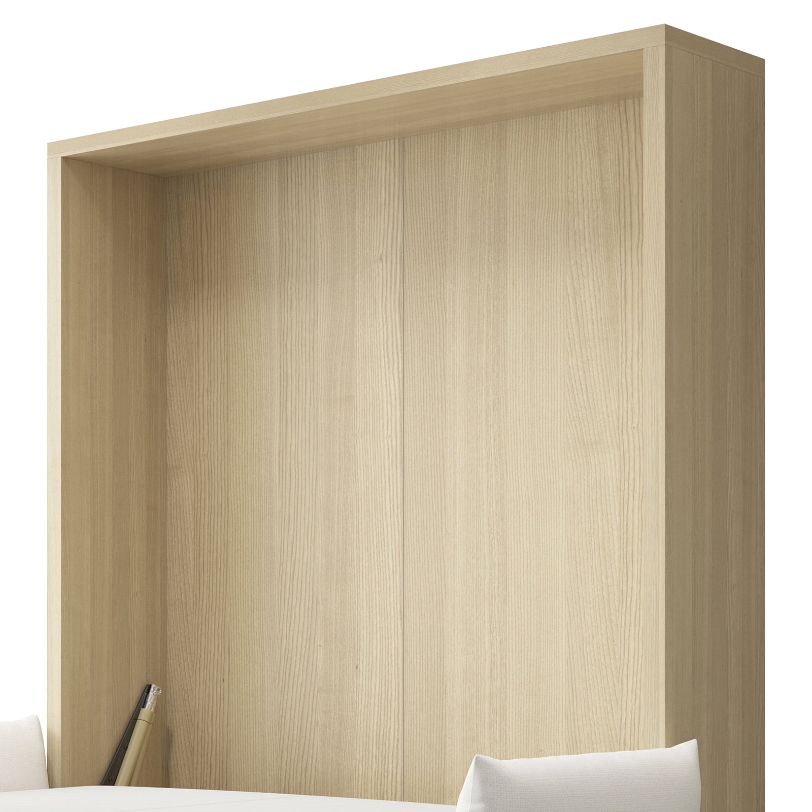 Byron Queen 2-in-1 Foldout Wall Bed & Sofa in White, featuring a light-wood interior with top shelf, vertical panels, and white pillows at the bottom, suggesting a bed or seating area integration. Pens in corner.