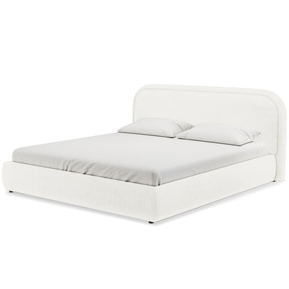 Calix Super King Boucle Bed Frame in Cream White, featuring a low-profile platform with an upholstered frame, rounded headboard, fitted sheet, and two pillows; sleek metal legs provide sturdy support.