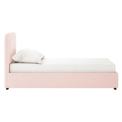 Carya Kids Single Fabric Bouclé Bed Frame in Light Pink features a blush-pink upholstered twin-size frame with a tall padded headboard. Includes a white sheet and pillow, ideal for a stylish children's room.