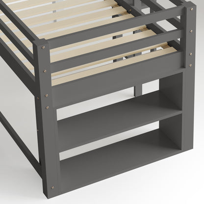 Coreen Solid Pine Storage Loft Bed with Slide - Grey, features grey bunk bed with wooden slats, integrated ladders, open shelves, and a slide, showcasing its space-efficient L-shaped design and functional storage.