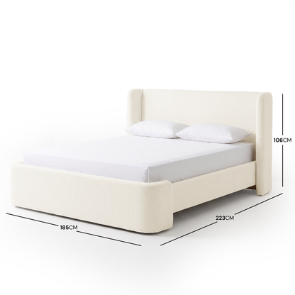 Full upholstered bed with dimensions displayed on a white background