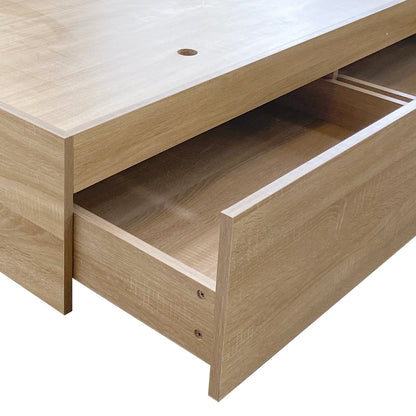 Eulalia Queen Storage Platform Bed Base with Drawer in Oak, showcasing a partially open drawer and a cable-management hole on top, highlighting its sleek design and practical storage features.