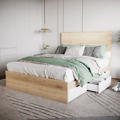 Fabiola Queen Storage Bed Base with Drawers in White & Oak features a wooden platform with built-in under-bed storage, white linens, a sage-green blanket, and a modern pendant light.
