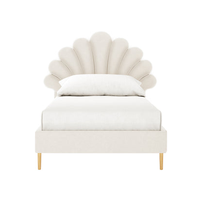 Fayette Kids Single Velvet Fabric Bed Frame in Cream White features a scalloped-fan headboard, simple white bedding, and light wood legs, offering a whimsical, stylish design perfect for a child's bedroom.
