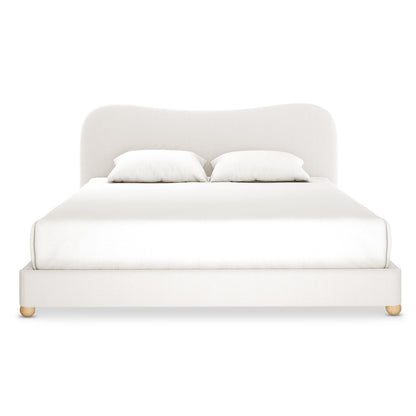 Ginnie Bouclé Curved King Bed Frame - Cream White features an off-white upholstered platform design with a gently curved headboard, matching linens, and short wooden feet, ideal for modern bedrooms.