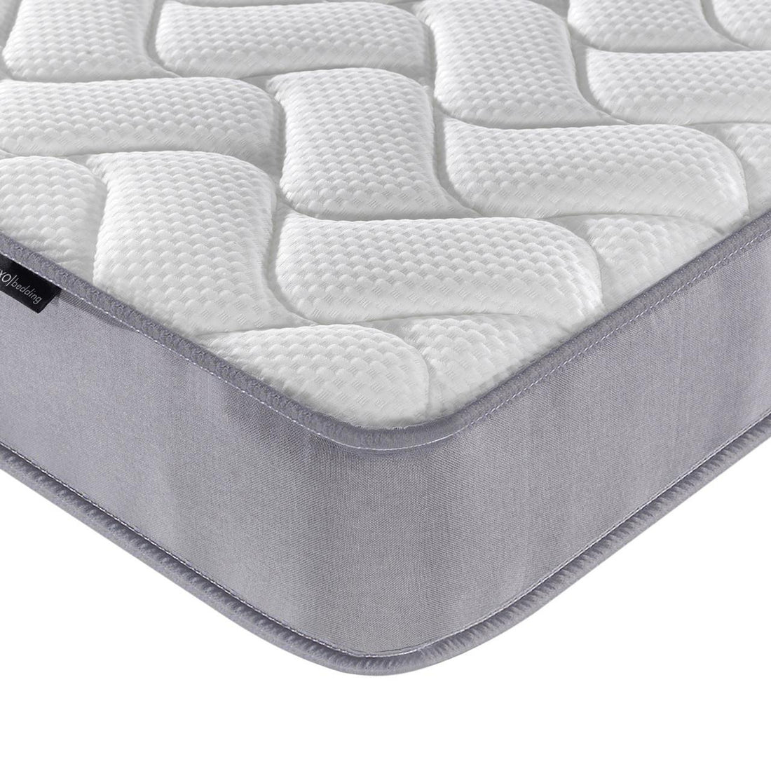 Corner view of Gio & Vesta Double Storage Loft Bed & Mattress Set in White, highlighting the quilted, textured pillow-top of the Vesta mattress and light-gray fabric-wrapped side.