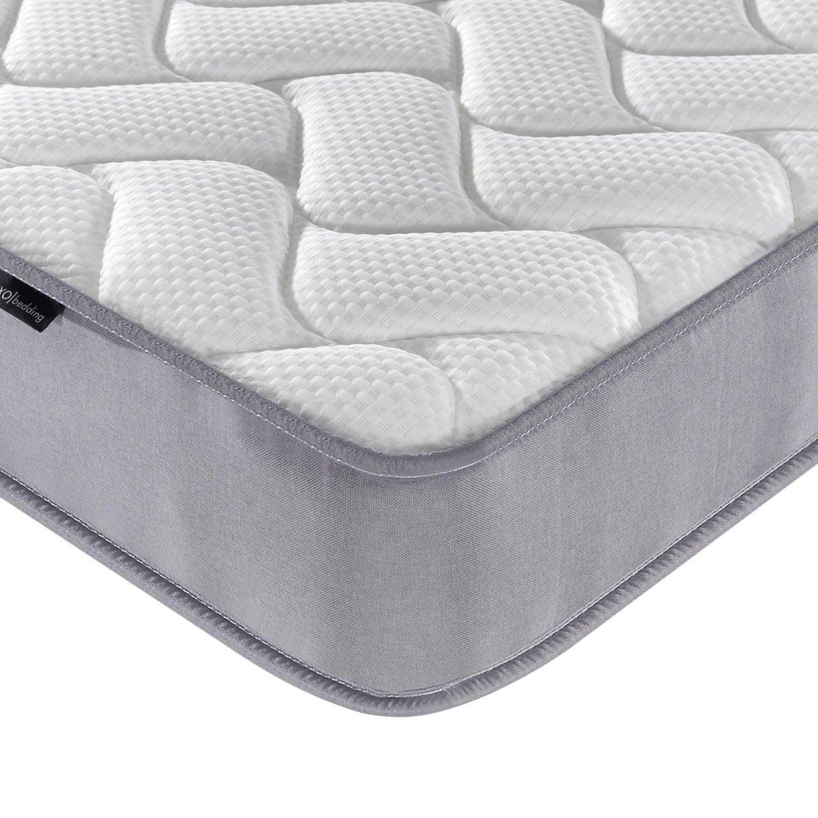 Corner view of Gio & Vesta Double Storage Loft Bed & Mattress Set in White, highlighting the quilted, textured pillow-top of the Vesta mattress and light-gray fabric-wrapped side.