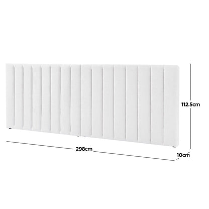 Aquila King Extra Wide Bouclé Headboard in Cream White, featuring vertical channel-tufting on soft fabric, measures 298 cm wide, 112.5 cm tall, and 10 cm thick, offering a luxurious, spacious design.