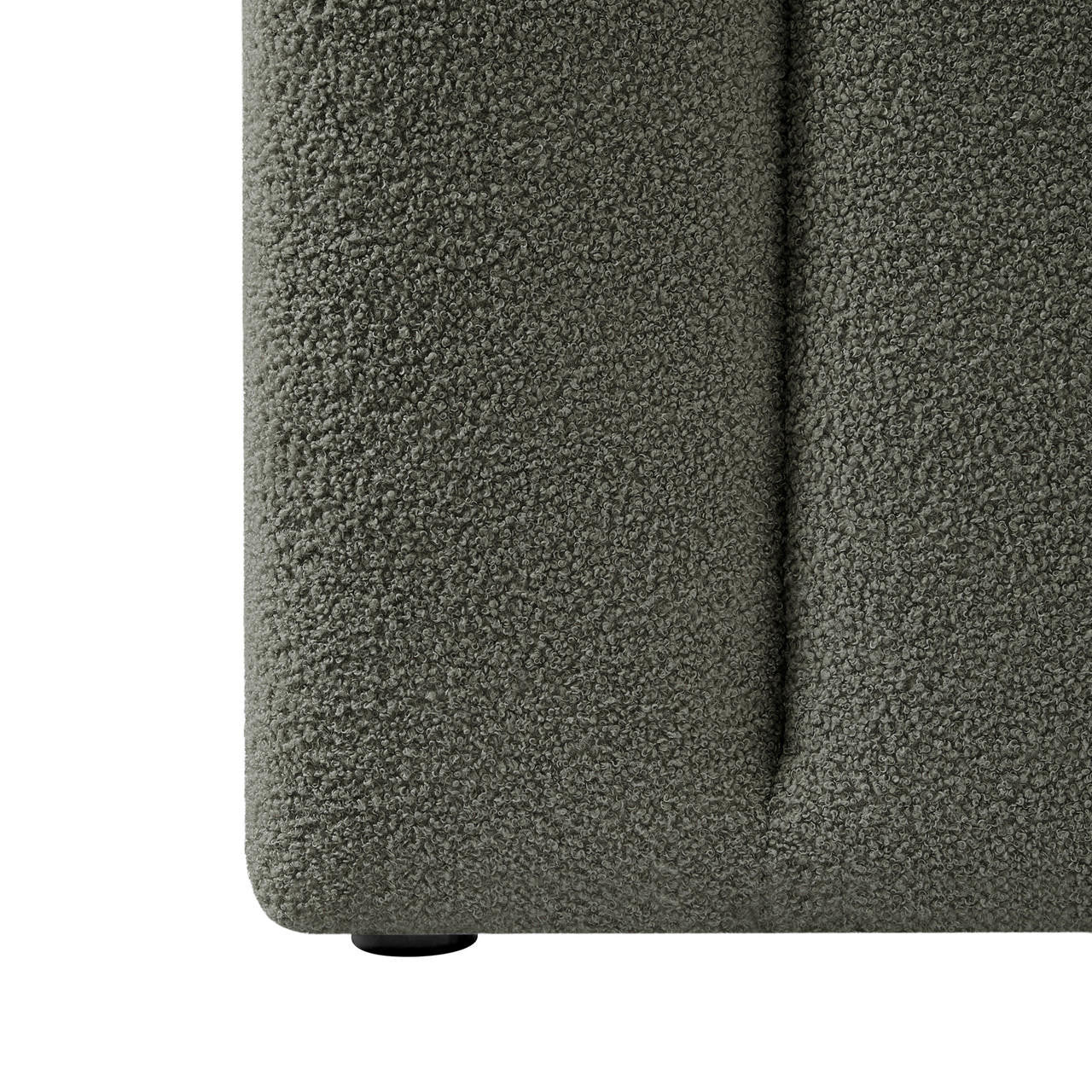 Close-up of the Aquila King Extra Wide Headboard & Fabia Gas-lift Storage Bed Base Set, showcasing the muted gray-green bouclé fabric and a small round black foot underneath.