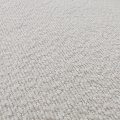 Close-up of the Harper Boucle King Bed Frame in eggshell white, showcasing its plush boucle upholstery and sturdy eucalyptus hardwood frame, highlighting the bed's modern sophistication and designer collaboration details.