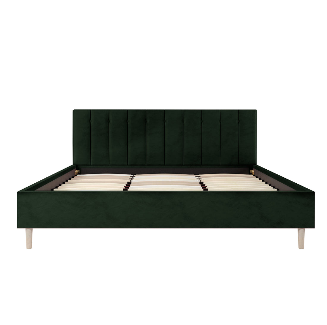 Kelly King Velvet Bed Frame – Dark Forest Green features a tufted black leather headboard, solid wood construction, and engineered slats, showcasing luxurious design and robust support for a regal bedroom centerpiece.