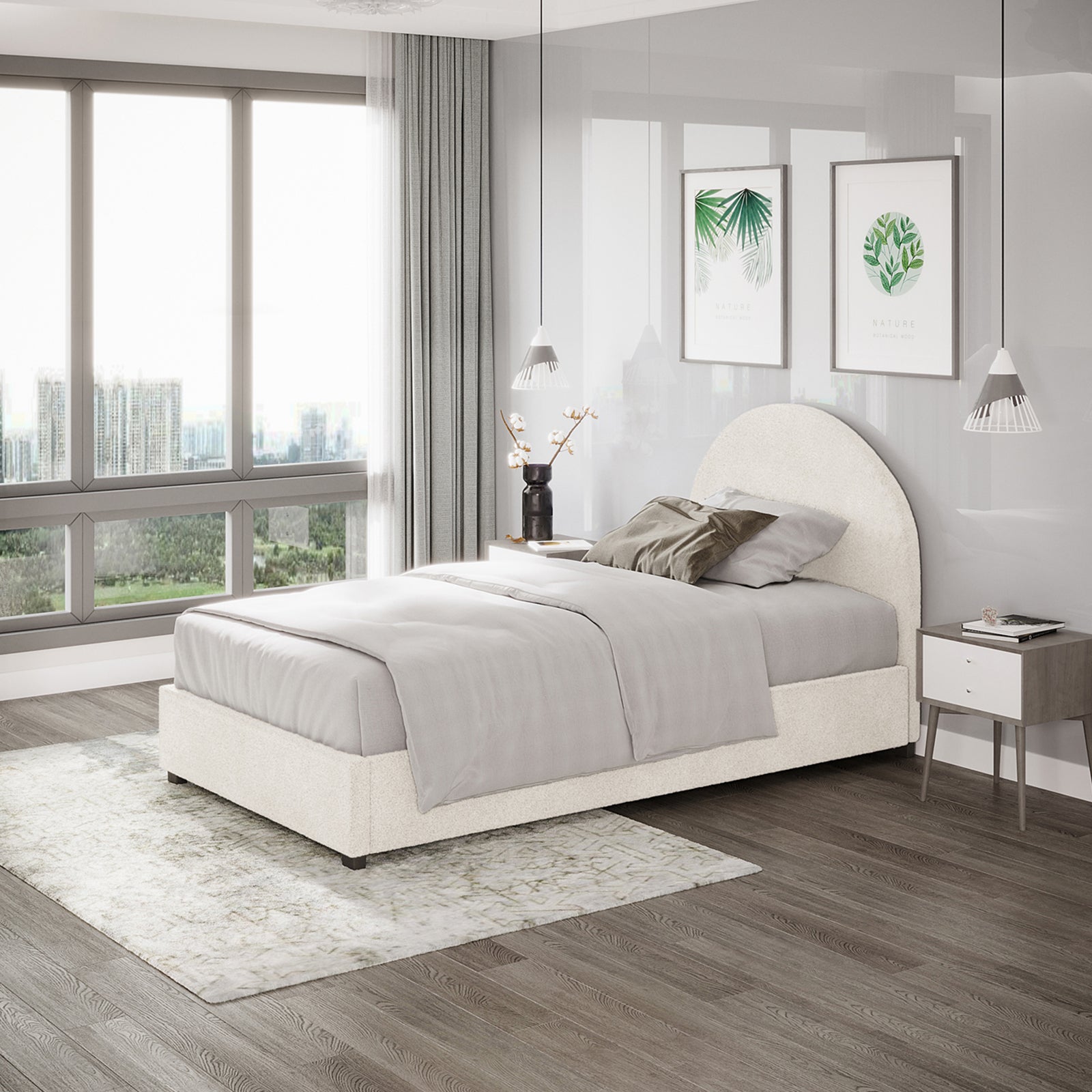 Lunia King Single Bouclé Bed Frame with Gas Lift Storage in cream white, featuring elegant bouclé upholstery, a rounded headboard, and positioned in a modern bedroom with pendant lights and botanical prints.