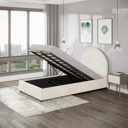 Lunia Single Bouclé Bed Frame with Gas Lift Storage – Cream White, featuring a lift-up upholstered platform revealing large storage, arched headboard, and elegant setting with pendant lights and botanical prints.