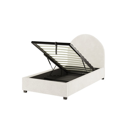 Lunia Single Bouclé Bed Frame with Gas Lift Storage features an arched headboard, light fabric, short block legs, and a propped-open slatted mattress support revealing spacious under-bed storage.