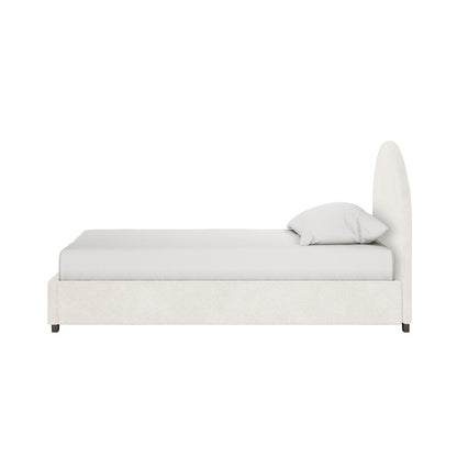 Lunia Single Bouclé Bed Frame with Gas Lift Storage – Cream White; minimalist design, off-white fabric, low base, tall rounded headboard, matching mattress and pillow, rests on dark feet.
