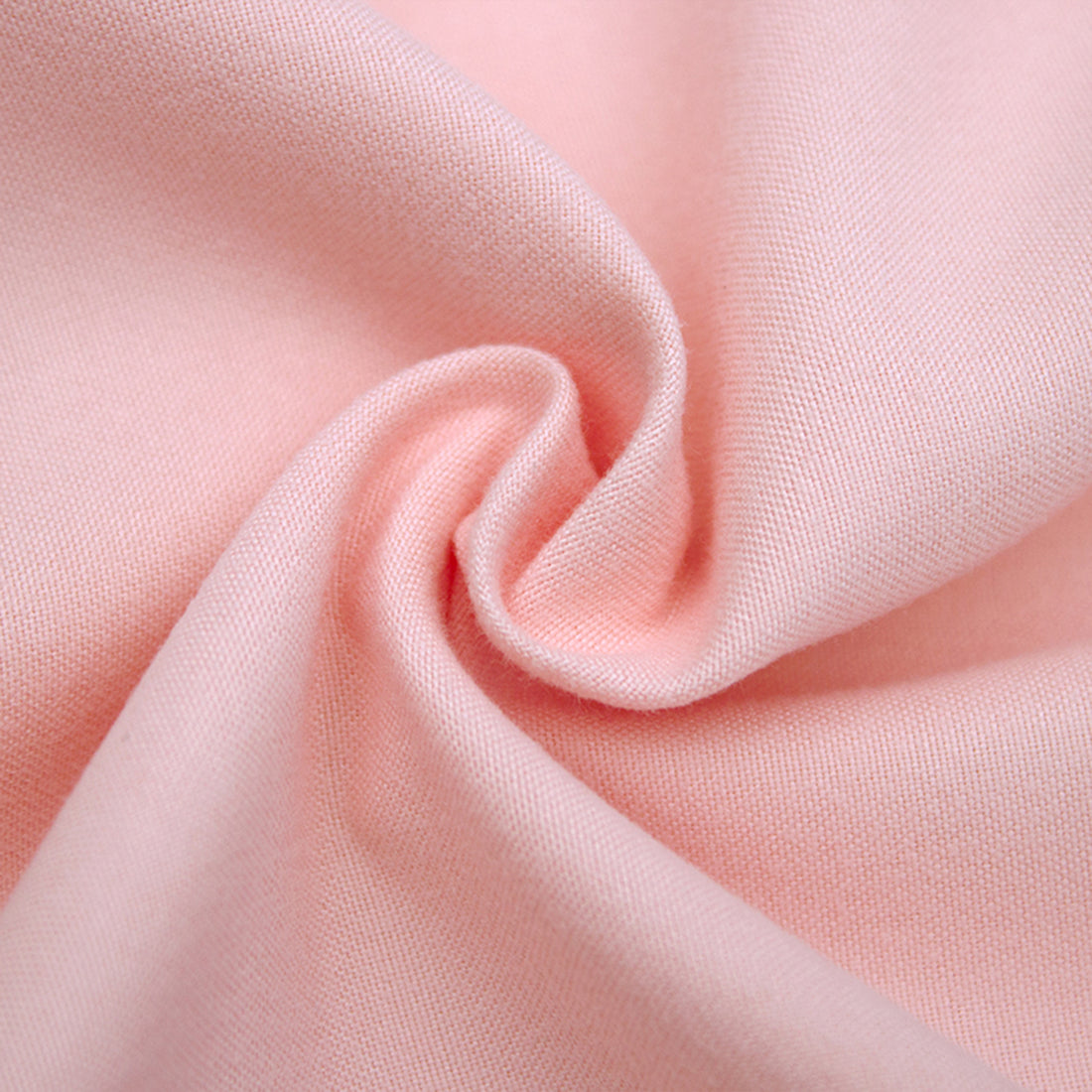 Valeria 1000TC Ultra Soft Bed Sheet Set - Blush King Single features a close-up of its luxurious, ultra-soft pink fabric, showcasing its smooth texture and high-quality craftsmanship.