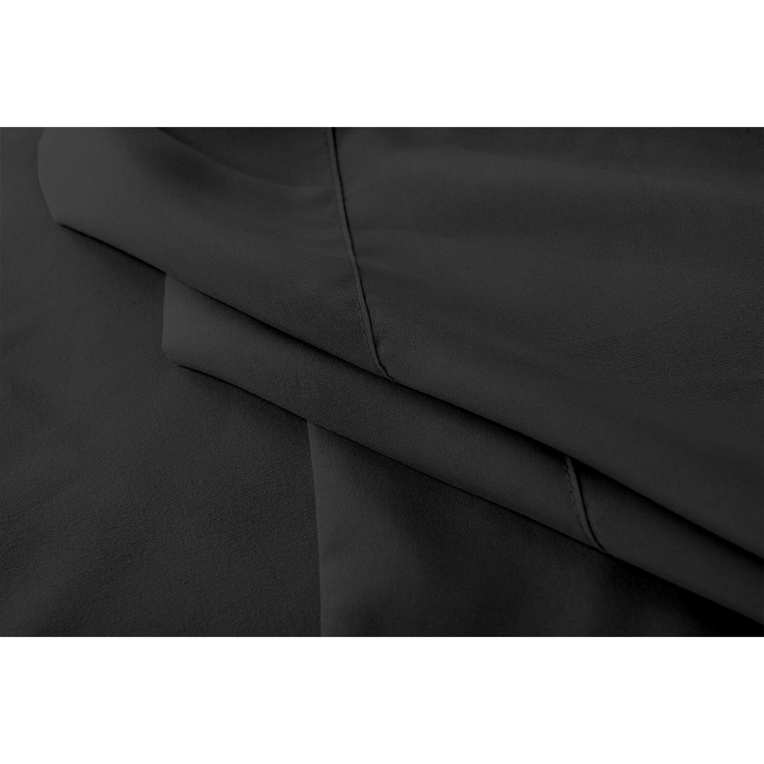Close-up of the Valeria 1000TC Ultra Soft Bed Sheet Set – Black, showcasing its smooth texture and high-quality fabric, ideal for enhancing the elegance and comfort of a queen-sized bed.