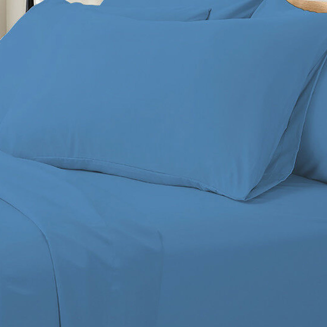 Valeria Single 1000TC Ultra Soft Bed Sheet Set in Blue, showcasing a fitted sheet and matching pillowcase, highlighting the smooth texture and luxurious appearance of this high-thread-count bedding ensemble.