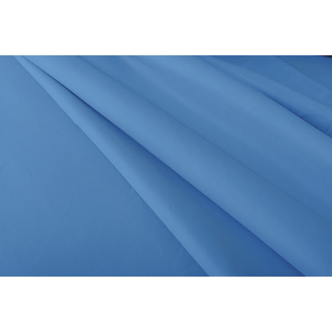 Valeria Single 1000TC Ultra Soft Bed Sheet Set in Blue, featuring a smooth, solid-blue fabric draped in soft folds, showcasing its luxurious texture and elegant appearance.