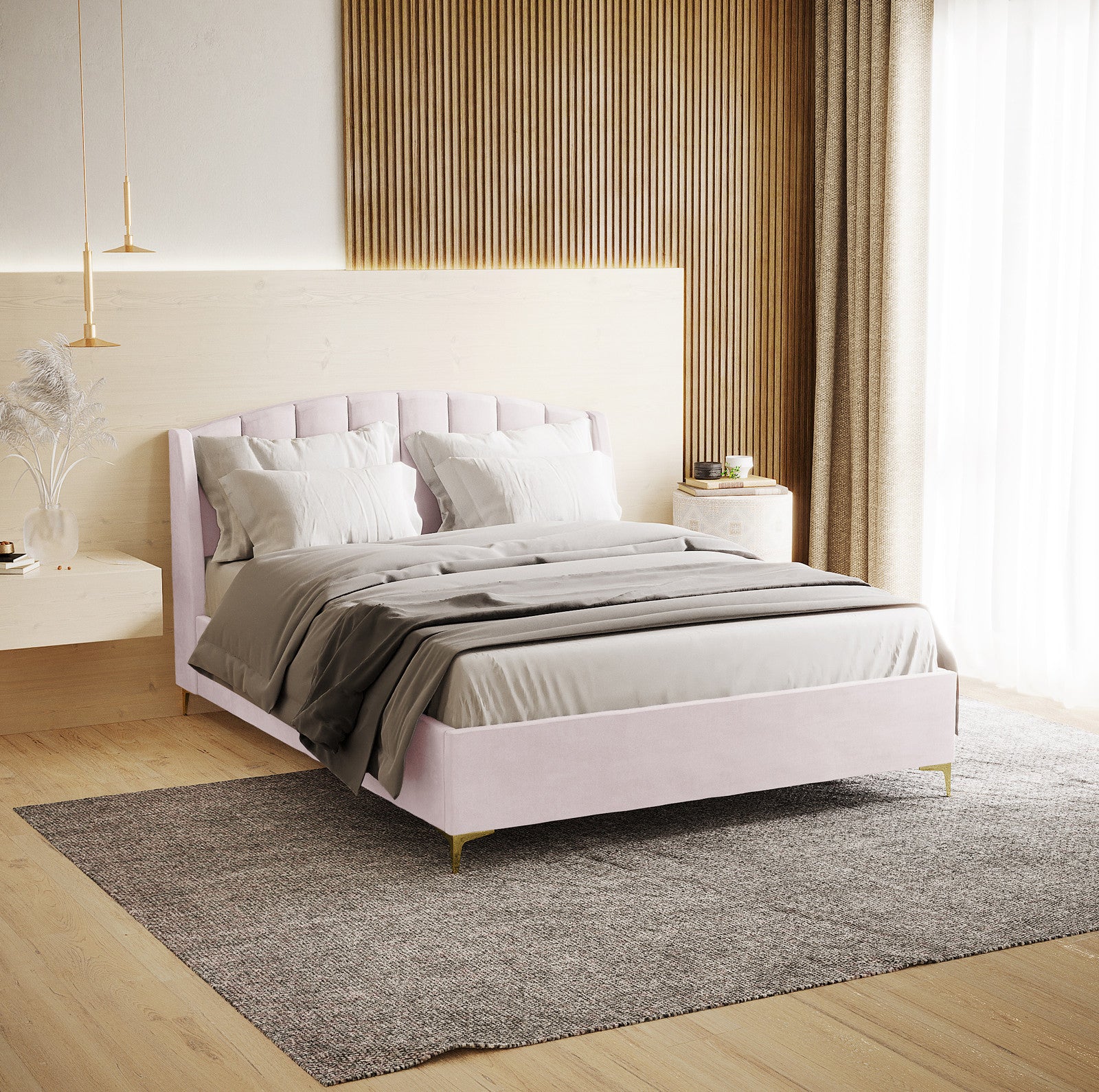 Lyra Velvet Bed Frame with Winged Headboard - Soft Pink Double, featuring a tufted headboard, neutral linens, and gold pendant lamps, creates a luxurious, serene bedroom setting.