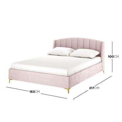 Lyra Velvet Bed Frame with Winged Headboard - Soft Pink King featuring blush-pink upholstery, tufted headboard, gold legs, and dimension lines indicating 163 cm width, 217 cm depth, and 100 cm headboard height.