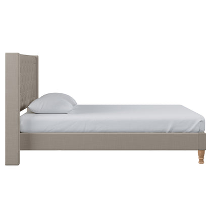 Maggie Queen Winged Fabric Bed Frame in Warm Grey, featuring a tall, tufted headboard, upholstered in light beige fabric, with a solid slat base and white-sheeted mattress and pillows.