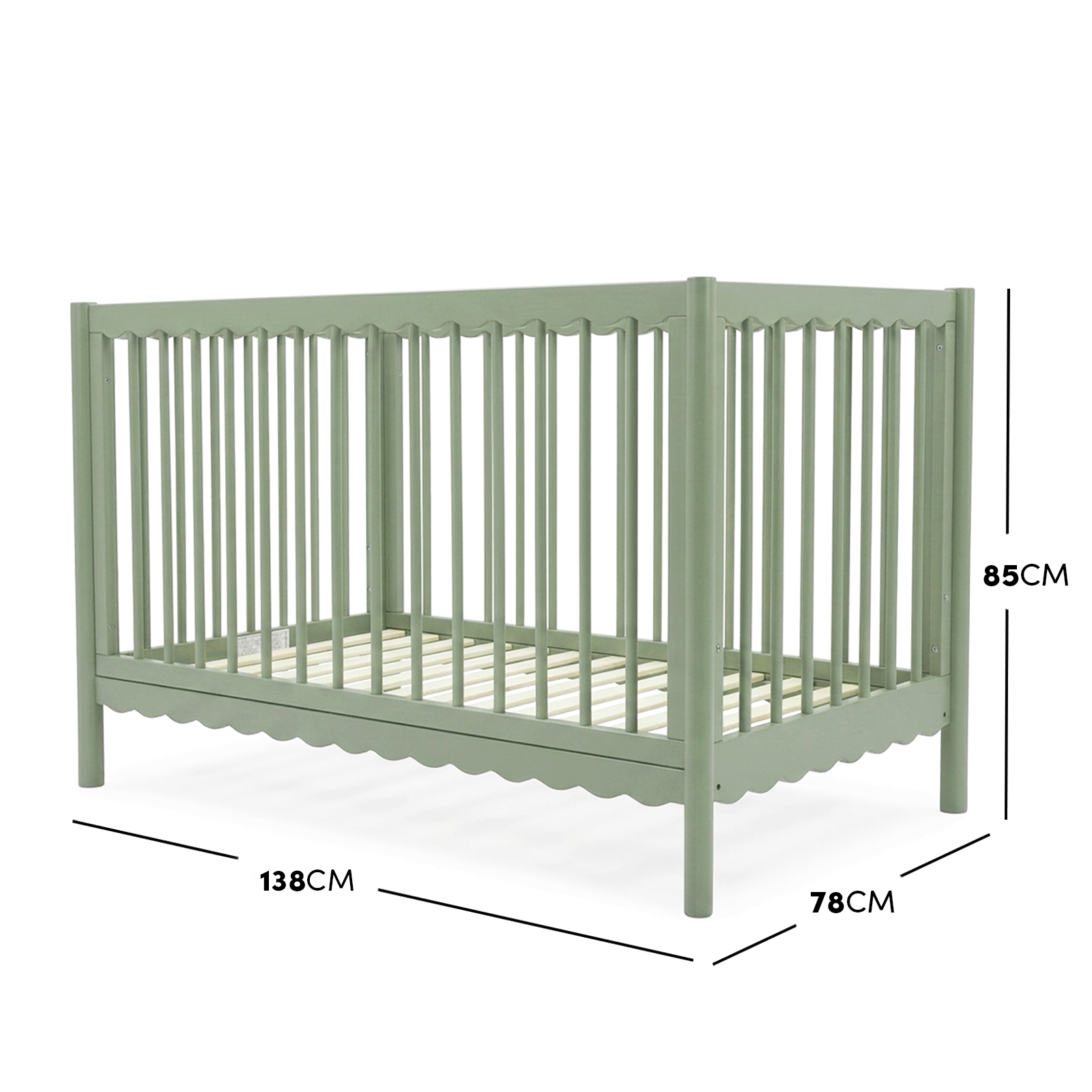 Sage green timber baby cot with scalloped base molding and dimensions diagram.