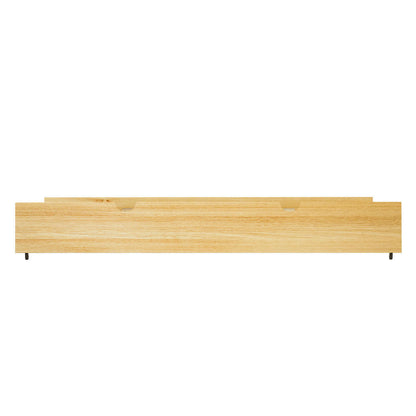 Narell Solid Pine Single Pull-Out Trundle Bed in Natural, featuring a long, low wooden drawer with two semicircular cut-out handles and small gliders underneath, designed for easy under-bed storage.