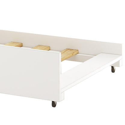 Narell Single Solid Wood Pull-Out Trundle Bed in White, featuring a rectangular wooden frame with caster wheels and wooden slats for mattress support, ideal for maximizing sleeping space efficiently.
