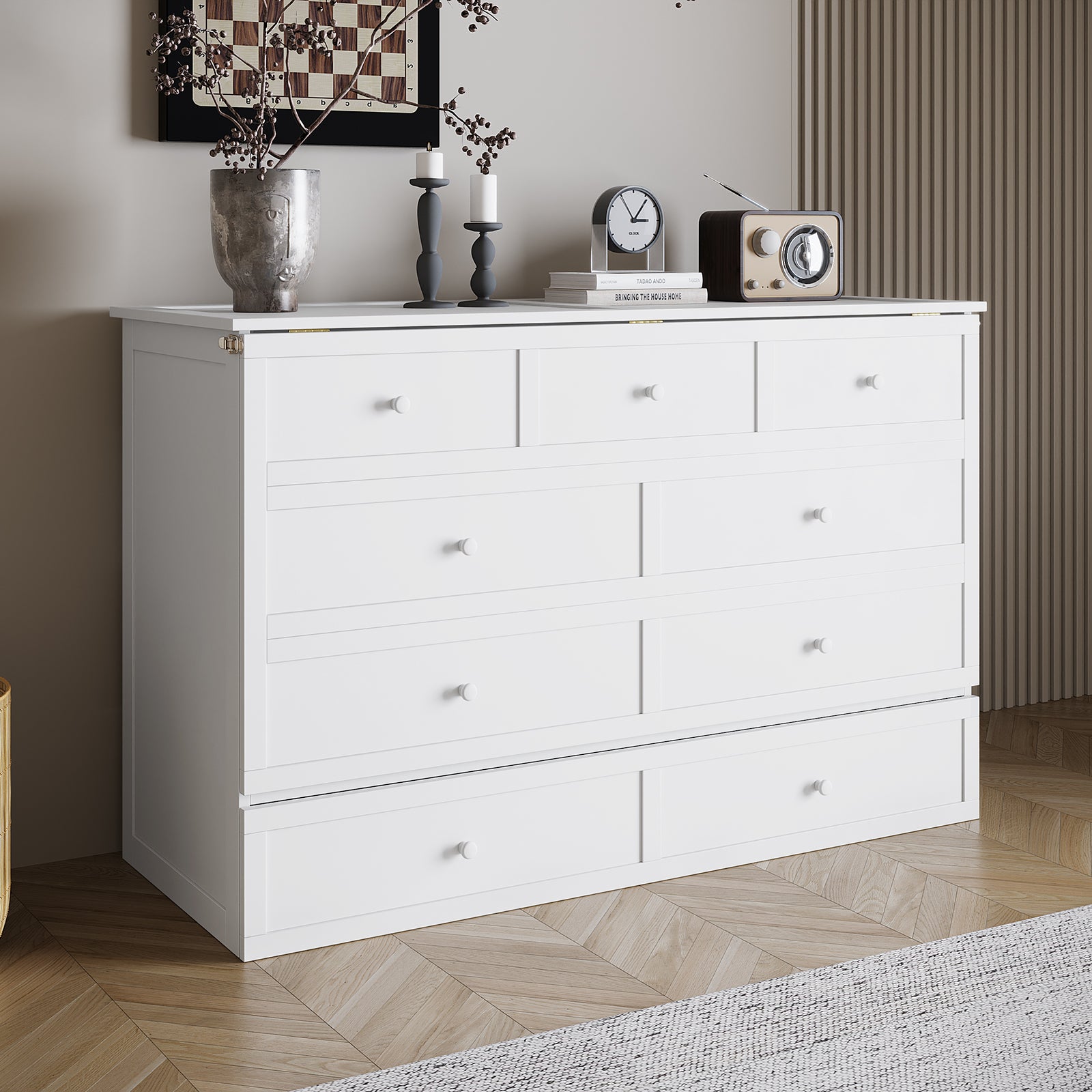 A stylish interior corner showcasing the Flecter 3-Fold Queen Mattress with Penn Smart Queen Murphy Bed, emphasizing its modern design and space-saving functionality amid chic decor elements like a dresser and decorative accents.