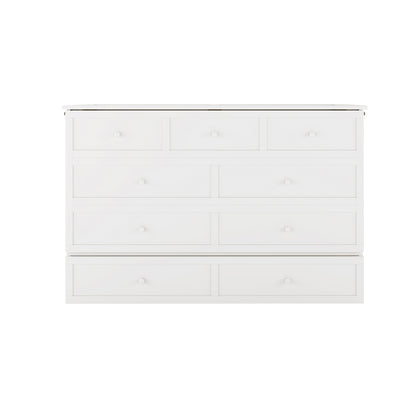 Front-angle view of the white convertible bed unit when not in use, featuring decorative drawer pulls and a solid top surface