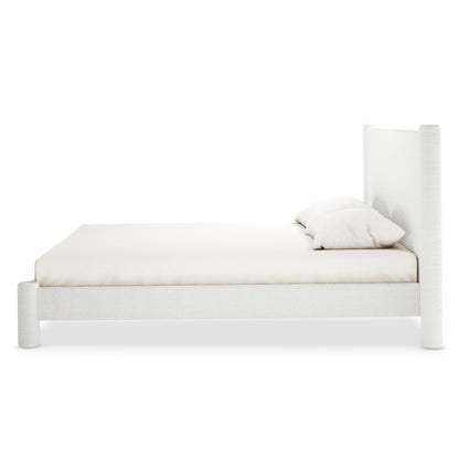 Rhoda King Upholstered Bouclé Bed in Cream White features a soft, rounded headboard and plush bouclé fabric, showcasing a luxurious, fully upholstered frame ideal for elegant, spacious master bedrooms.