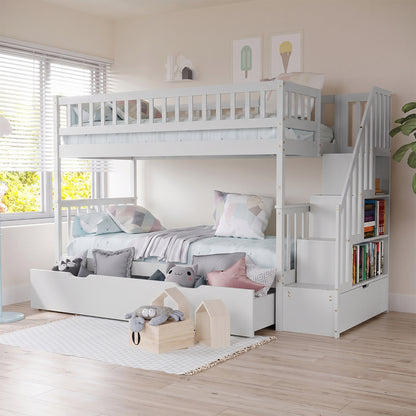 Sabbie Hardwood Single Storage Bunk Bed in White with top safety rails, pastel pillows, pull-out trundle, staircase with storage, and minimalist decor, perfect for space-saving and stylish kids’ rooms.