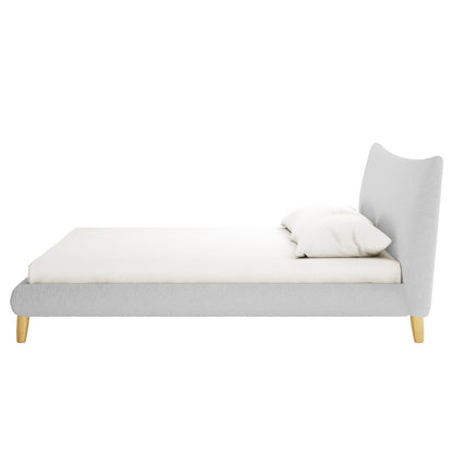 Estilla Boucle Upholstered Rainbow Single Bed features a minimalist design with a low-profile upholstered frame and headboard, supported by short wooden legs, complete with a simple mattress and two matching pillows.
