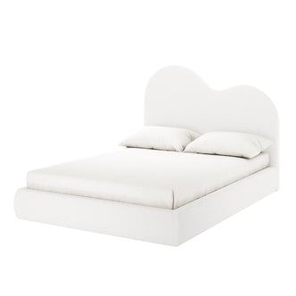 Thales Curved Boucle Bed Frame - Queen, featuring a plush curved headboard in cream white boucle fabric, on a bed with a white pillow.