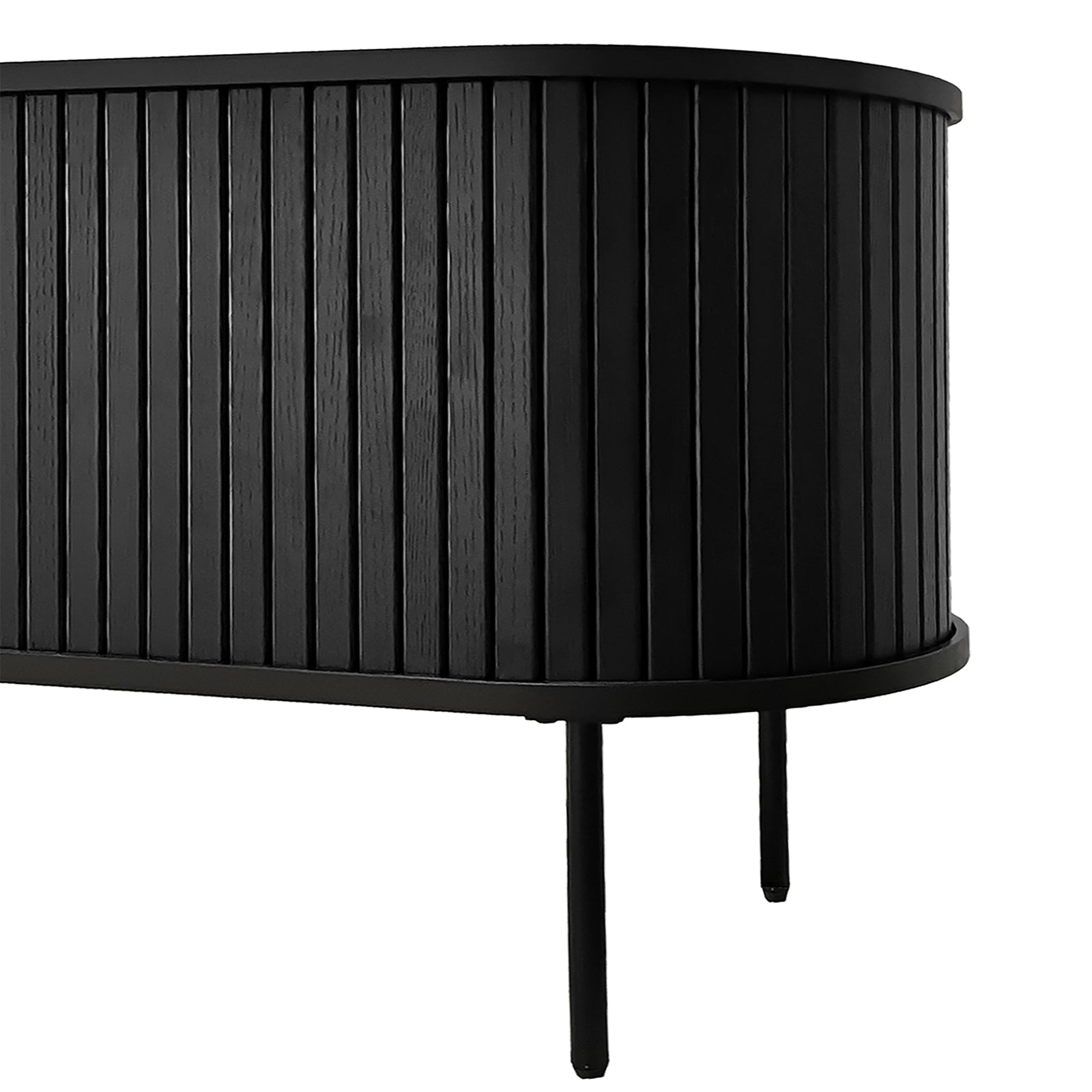 Aaron 160cm Fluted TV Unit - Black showcases a sleek, matte black design with an elongated oval shape, vertical slatted panels, and slim legs, perfect for modern living spaces.