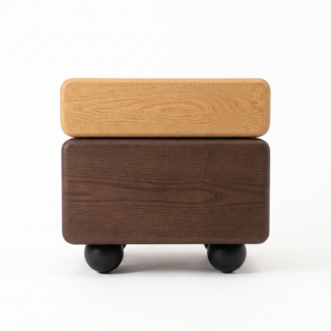 Small modern two-tone wooden side table with rounded edges on a white background
