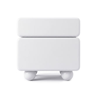 White modern nightstand with rounded edges and spherical legs on a white background