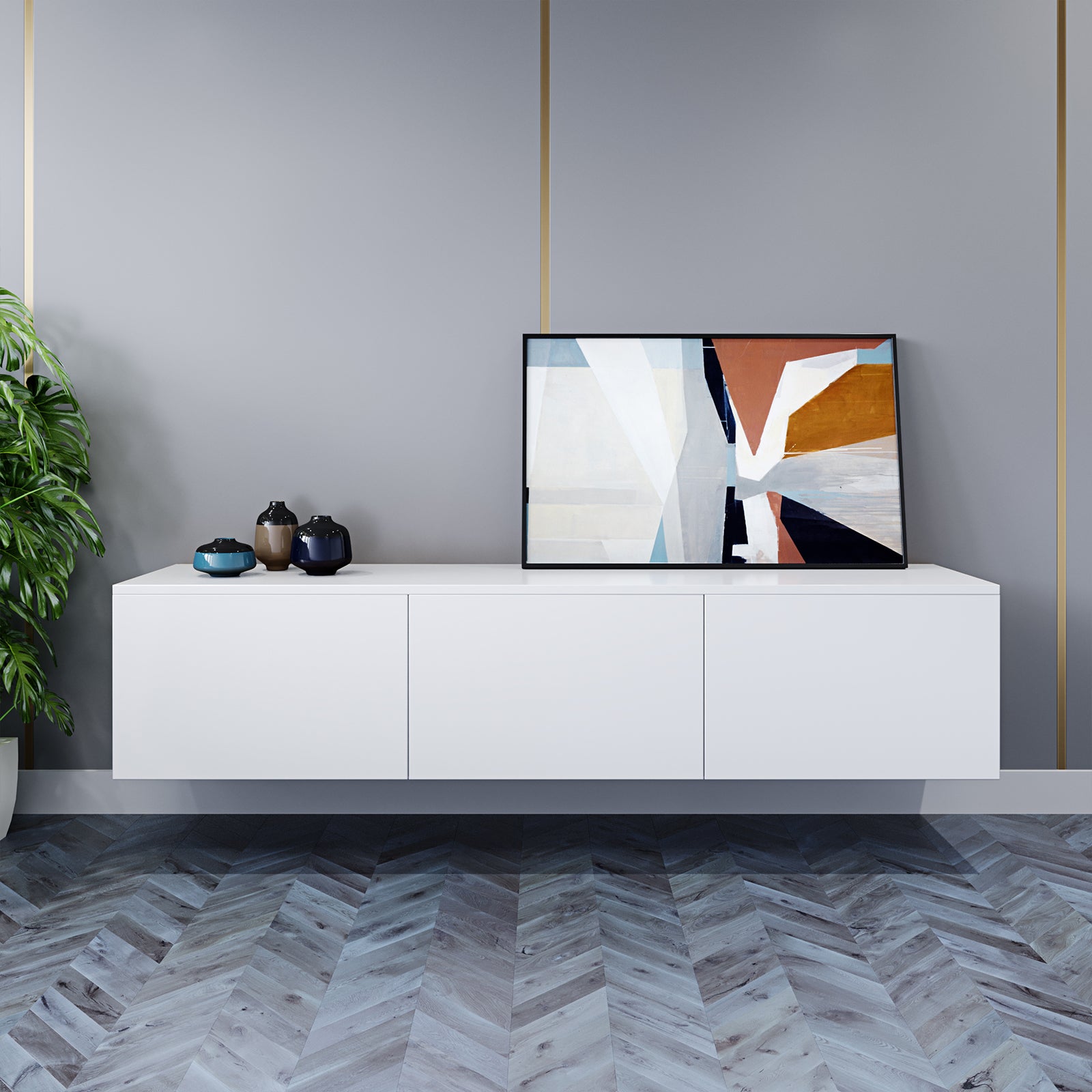 Luxo Bryan Floating Entertainment Unit – Pure White displayed with sleek, handle-less cabinets, showcasing its modern, space-saving design on a wall, complemented by a plant and white cabinet with a black frame.