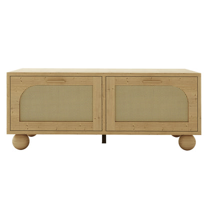 Carlo 110cm Rattan Coffee Table with Storage in Natural, featuring light wood, woven cane doors, and ball-shaped legs, offering a stylish and functional centerpiece for modern living spaces.