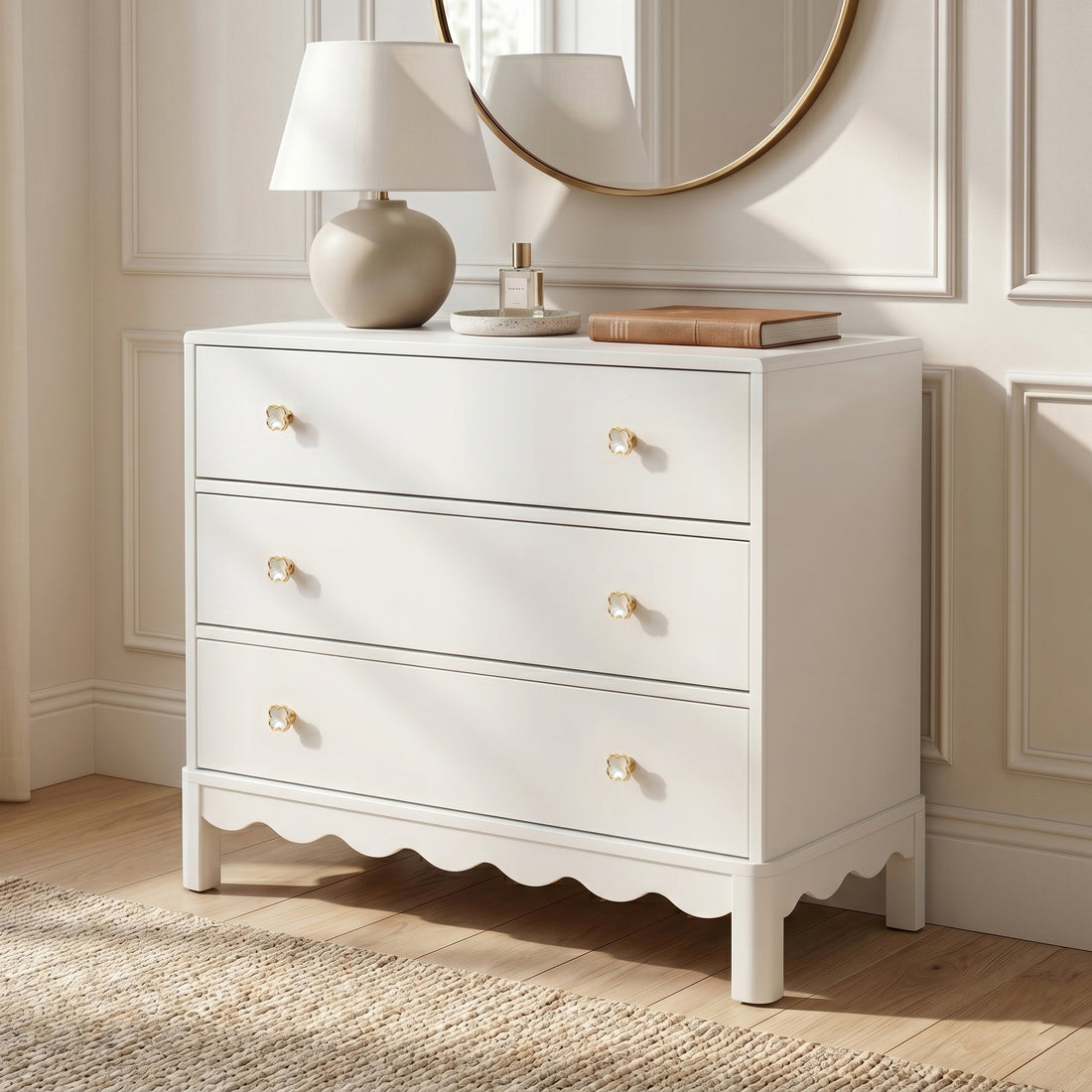 White three-drawer dresser with gold flower knobs on white background