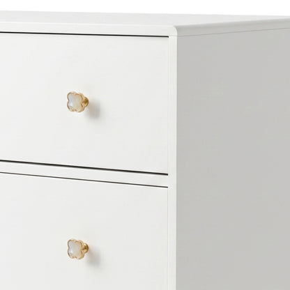 White three-drawer dresser with gold flower knobs on white background