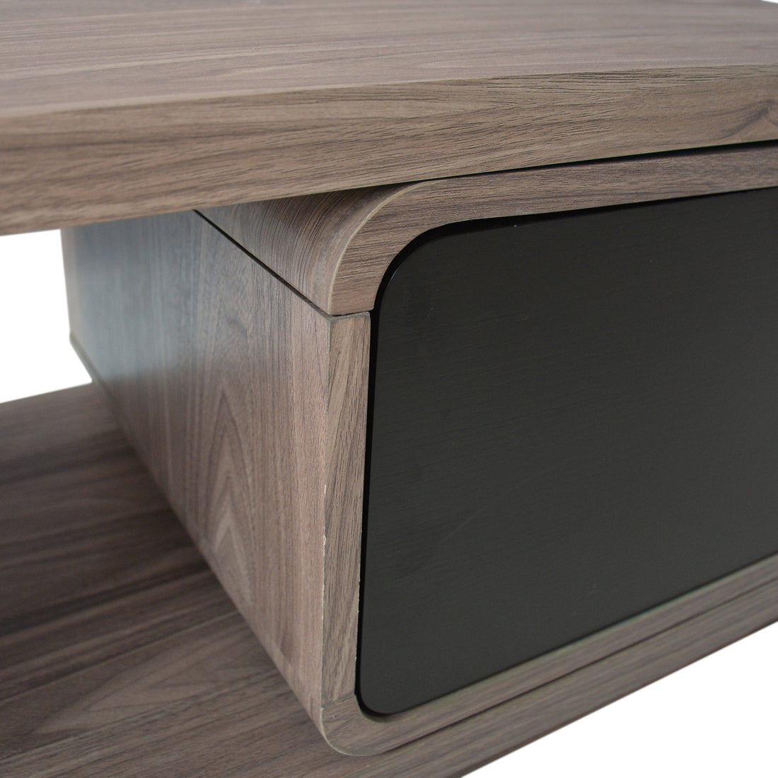 Galya Extendable Storage TV Unit - Teak, showcasing a modern wood-veneered design with a gray-brown shelf, curved compartment corners, and a matte-black front panel, ideal for sleek, organized living room setups.