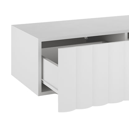 Close-up of the Hamish 200cm Entertainment Unit, showcasing its clean lines and wave design. Features visible handle-free drawers and a spacious top, illustrating its stylish and functional modern look.